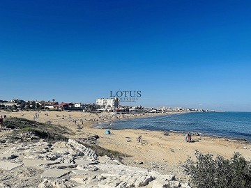 Topfloor in gewilde Urb. Altos de la Bahia XI met dakterras en zeezicht! - Lotus Properties