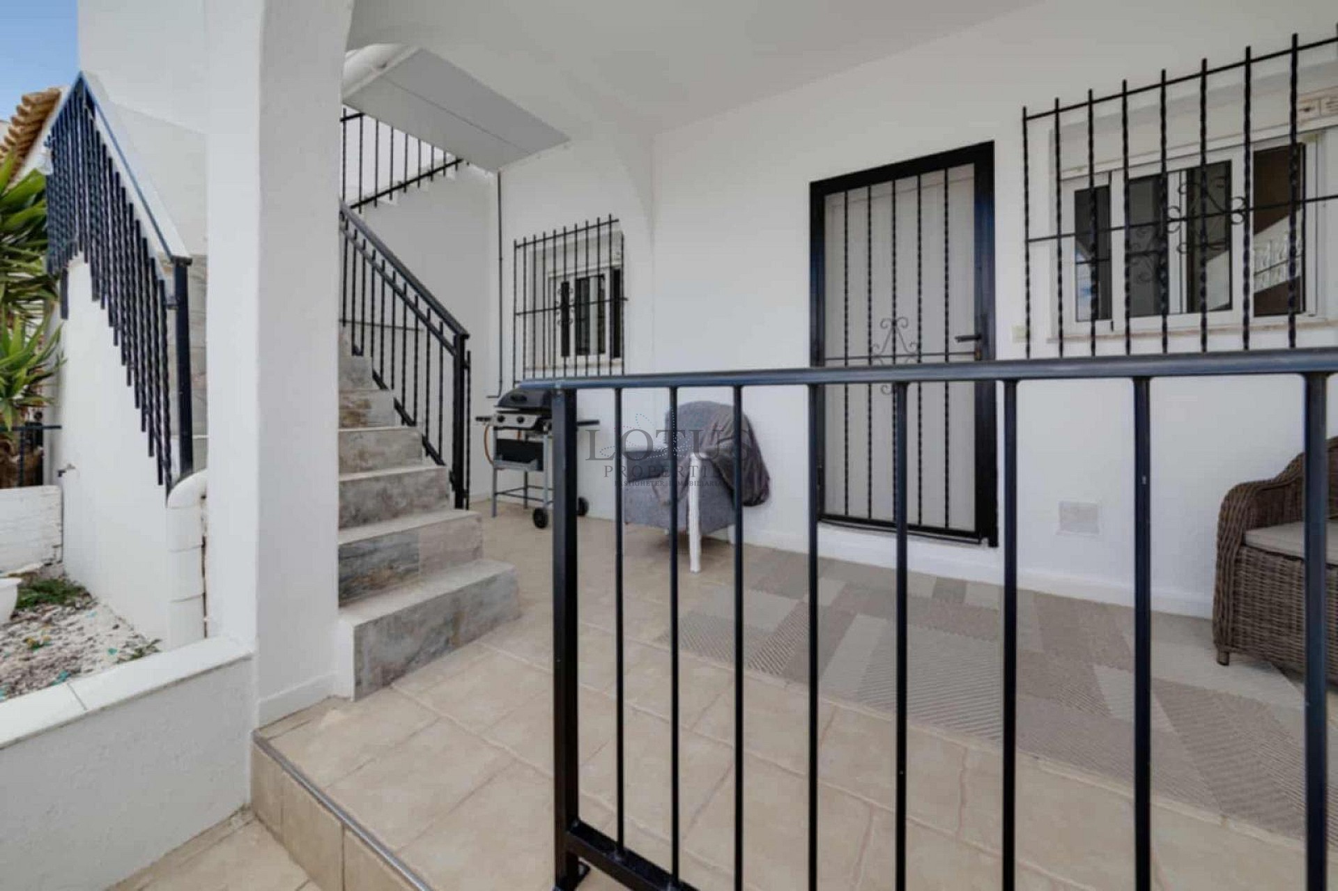 Charming Corner Townhouse with Stunning Roof Terrace and Sea Views in Villamartin - Lotus Properties