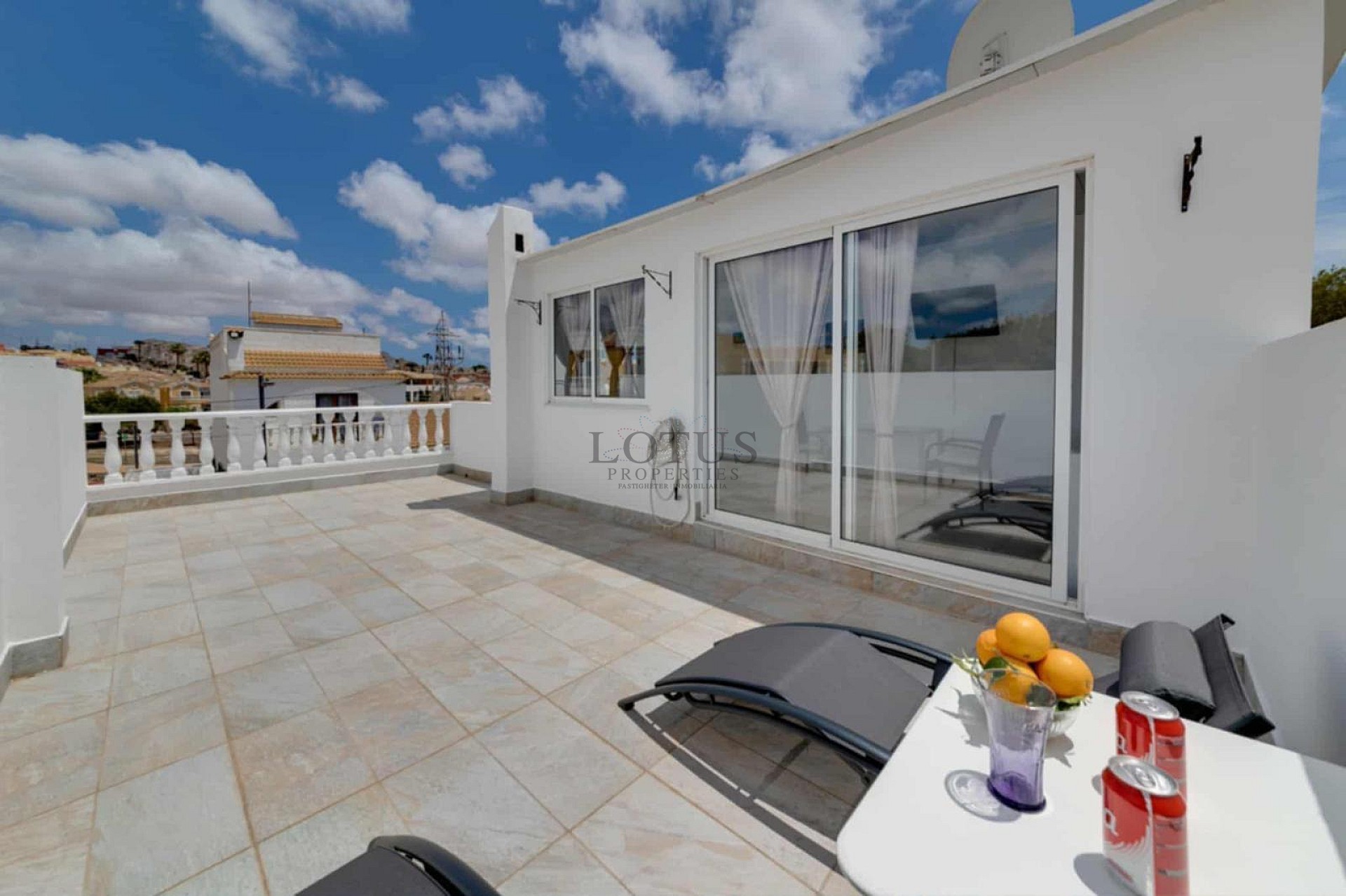 Charming Corner Townhouse with Stunning Roof Terrace and Sea Views in Villamartin - Lotus Properties