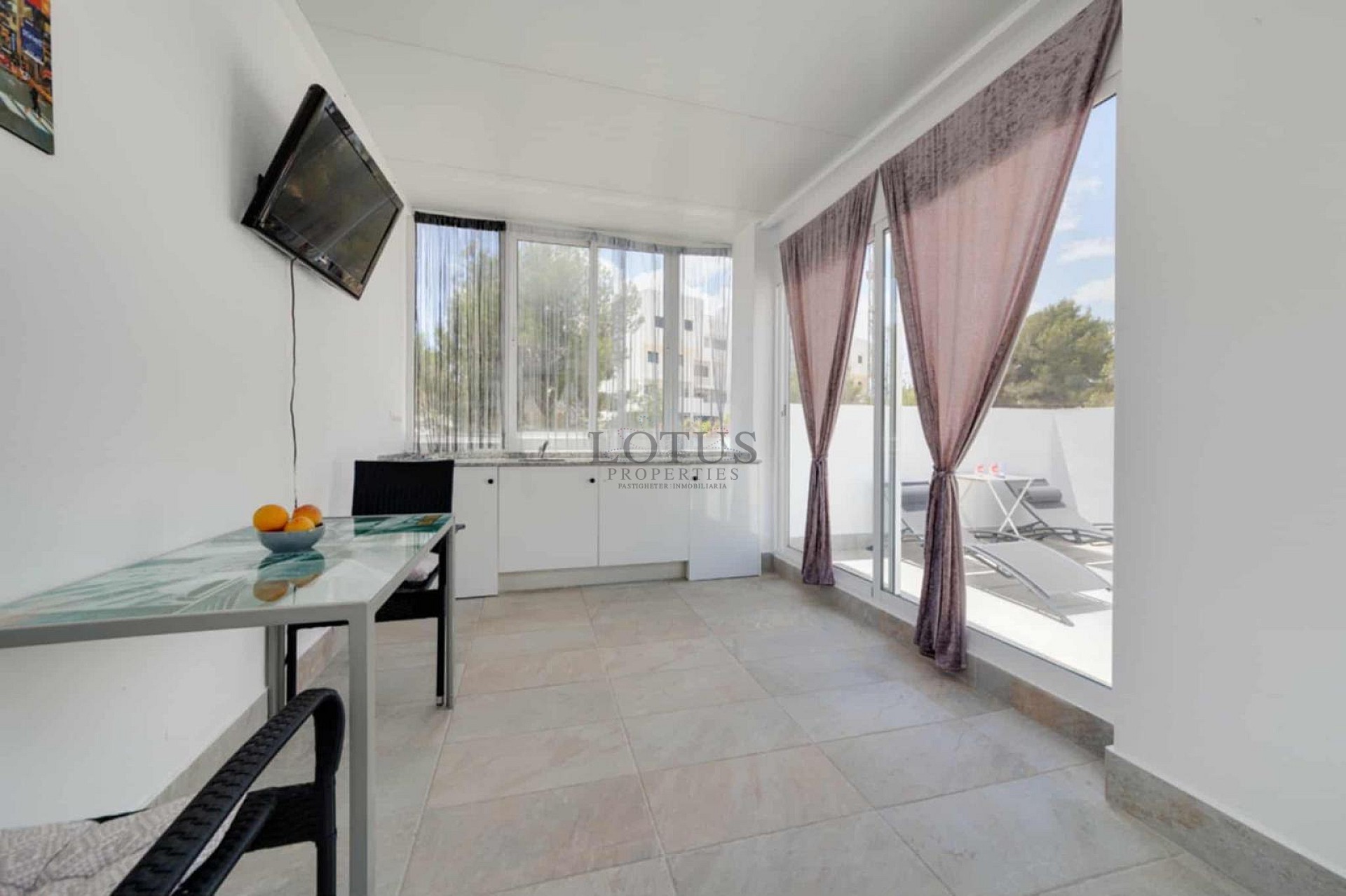 Charming Corner Townhouse with Stunning Roof Terrace and Sea Views in Villamartin - Lotus Properties