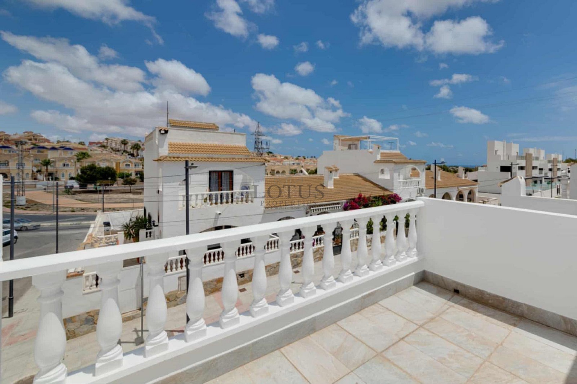 Charming Corner Townhouse with Stunning Roof Terrace and Sea Views in Villamartin - Lotus Properties