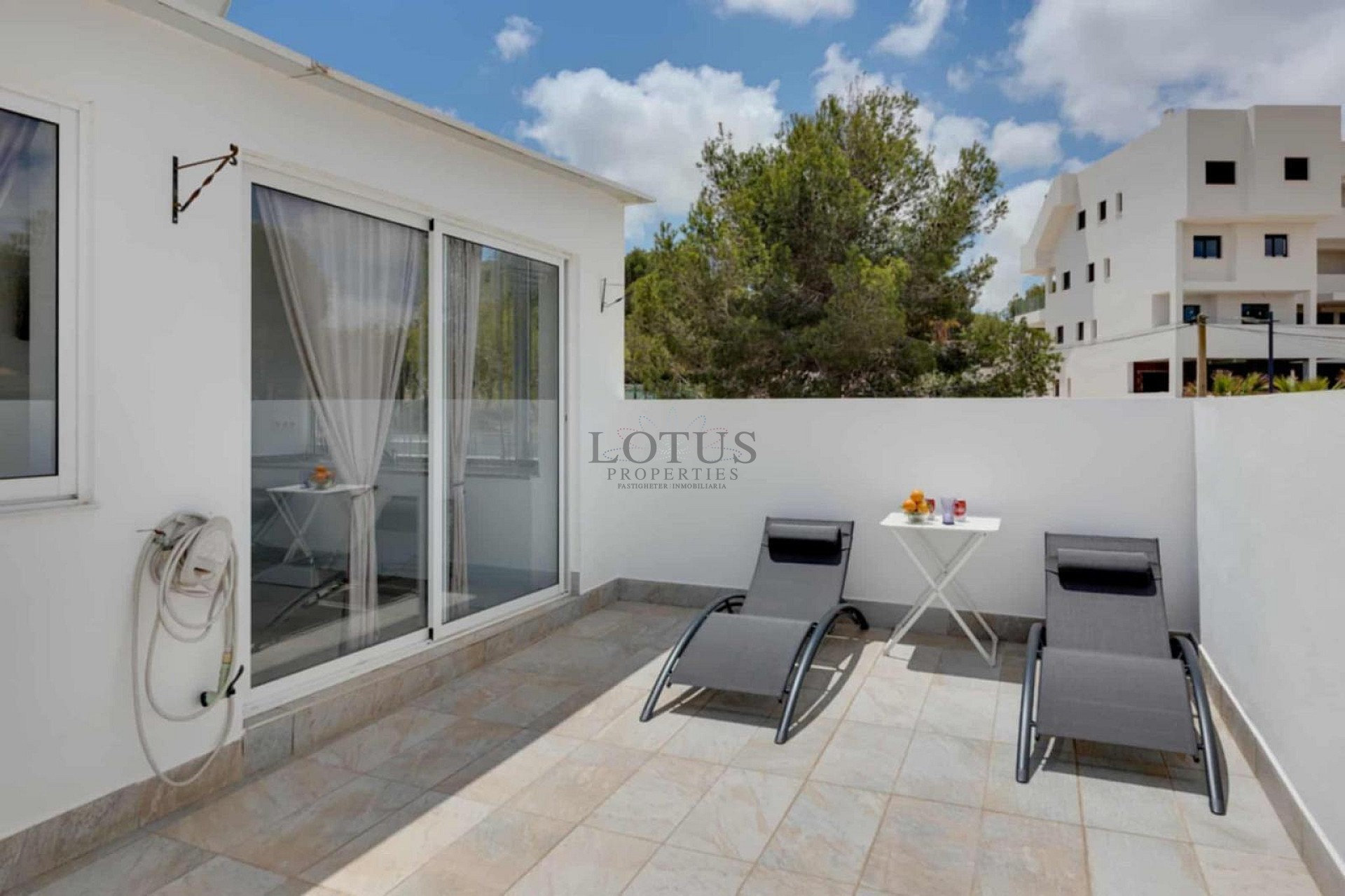 Charming Corner Townhouse with Stunning Roof Terrace and Sea Views in Villamartin - Lotus Properties