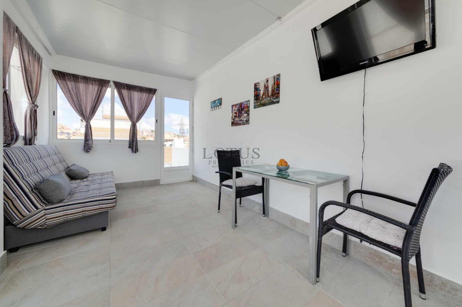 Charming Corner Townhouse with Stunning Roof Terrace and Sea Views in Villamartin - Lotus Properties