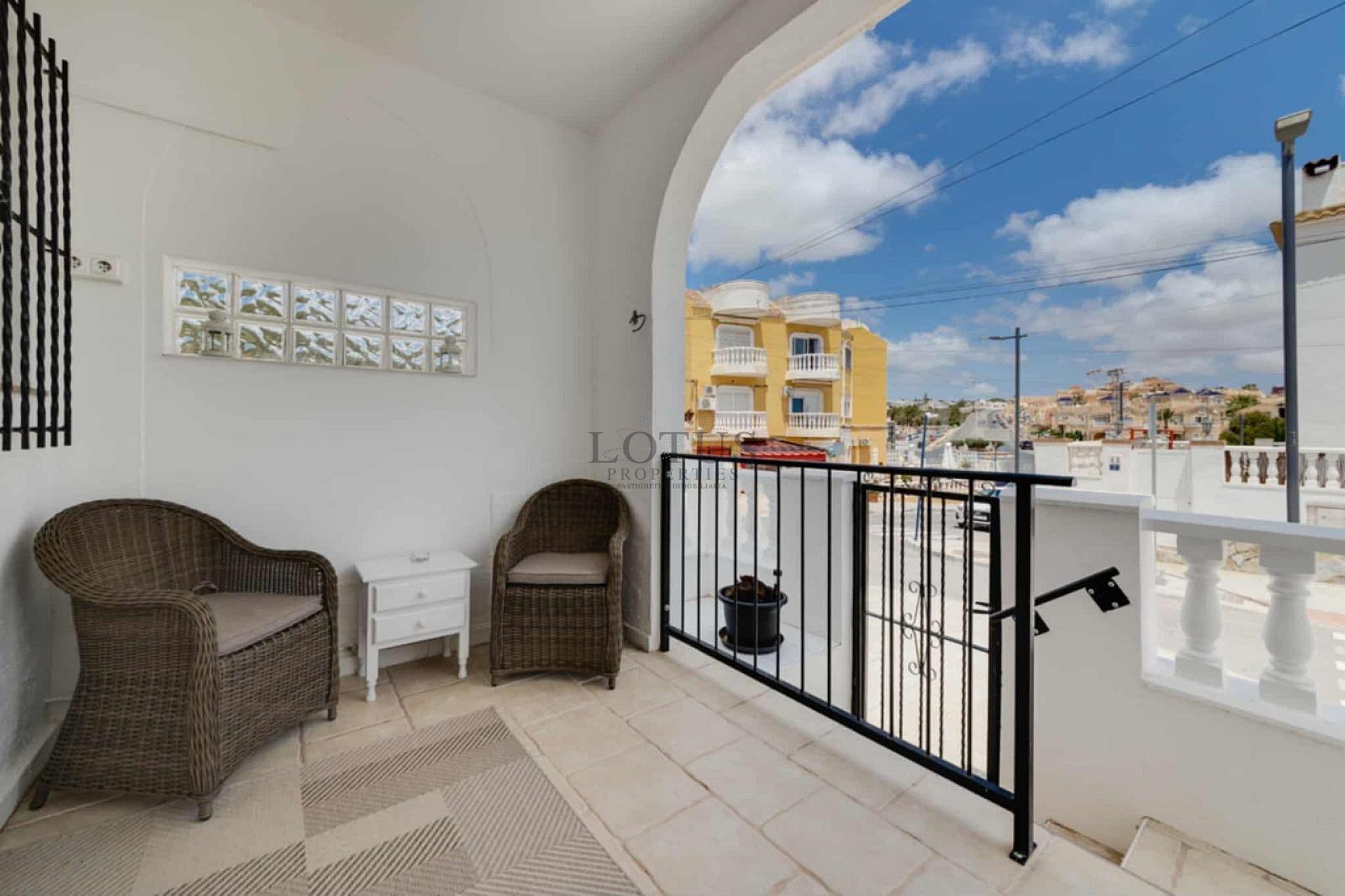 Charming Corner Townhouse with Stunning Roof Terrace and Sea Views in Villamartin - Lotus Properties
