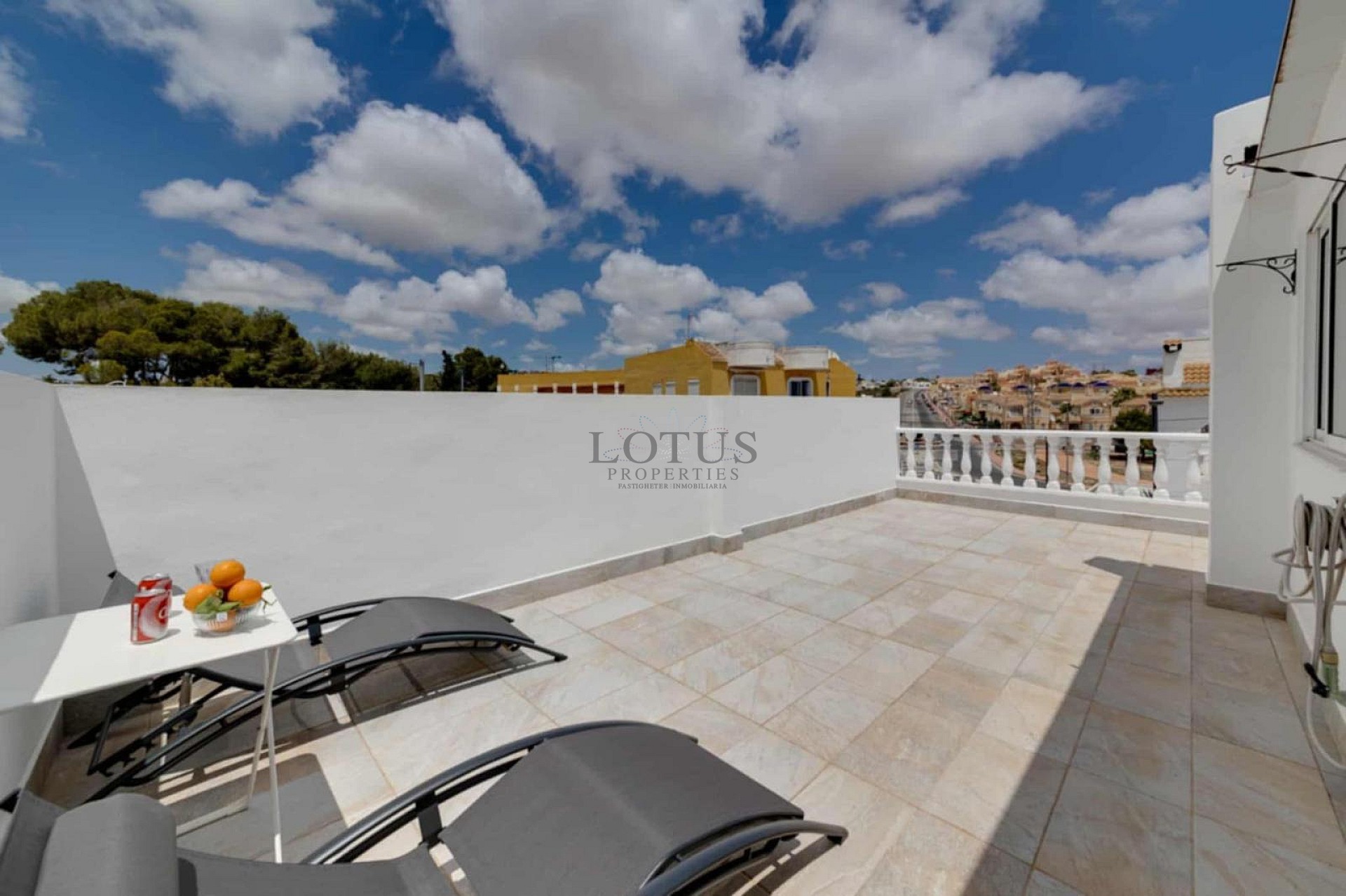 Charming Corner Townhouse with Stunning Roof Terrace and Sea Views in Villamartin - Lotus Properties