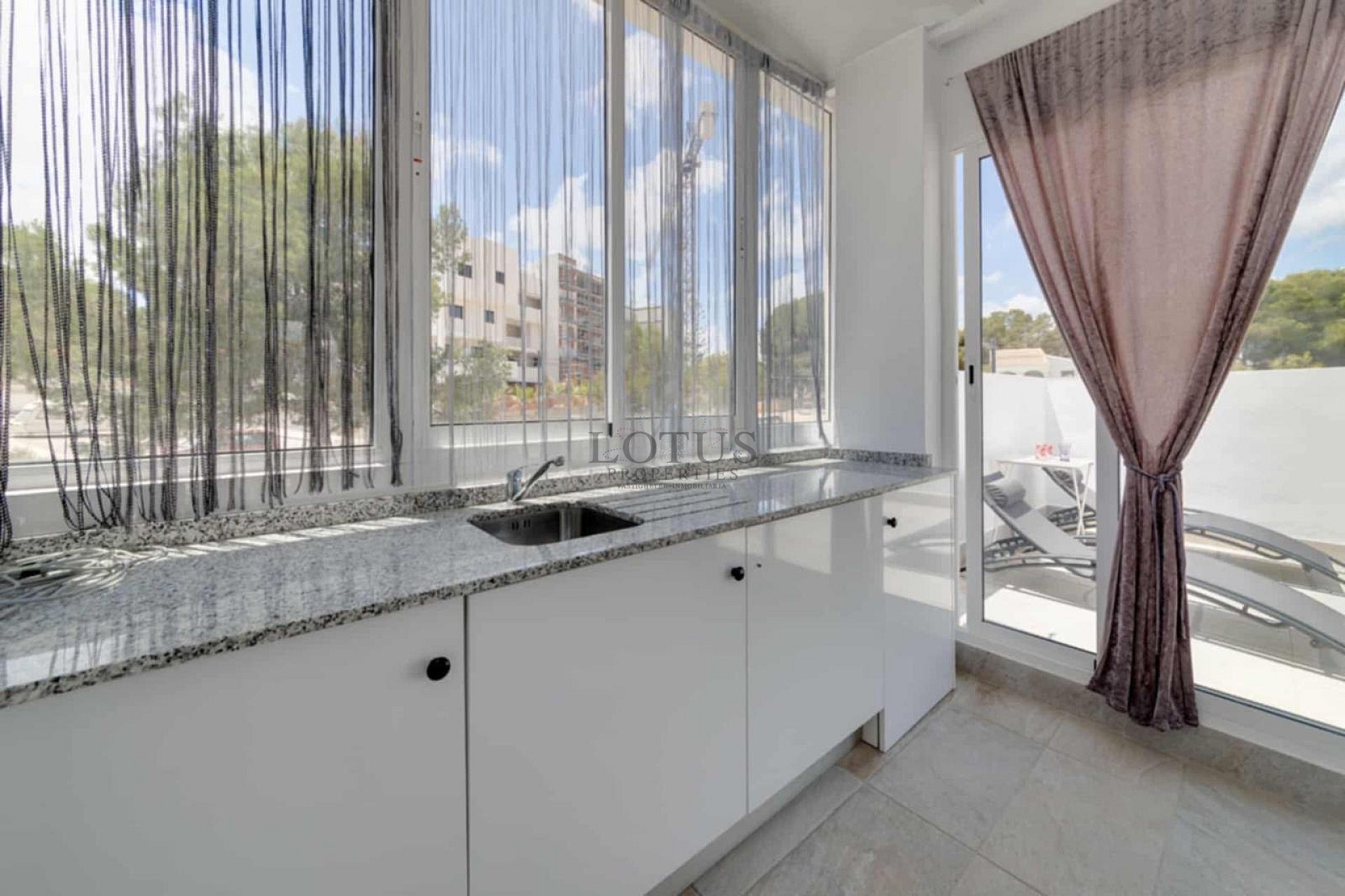 Charming Corner Townhouse with Stunning Roof Terrace and Sea Views in Villamartin - Lotus Properties